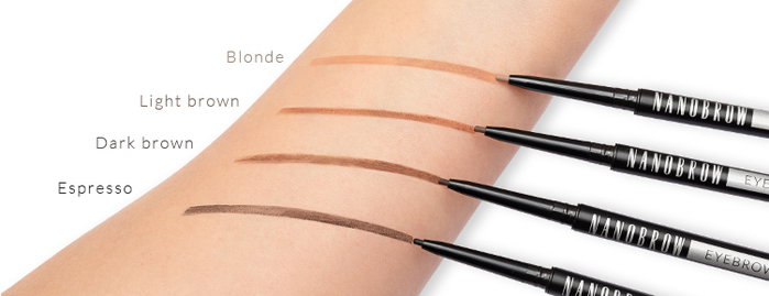 An arm presenting swatches of different shades of Nanobrow brow pencil